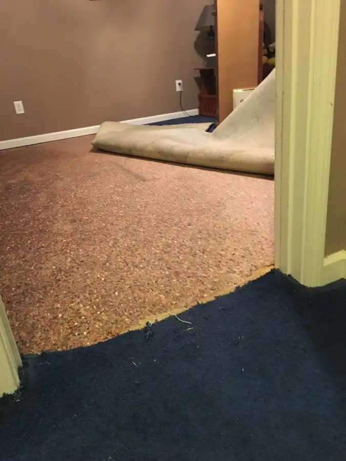 Carpet pad removal revealing water damage during Drying & Dehumidification in Othello